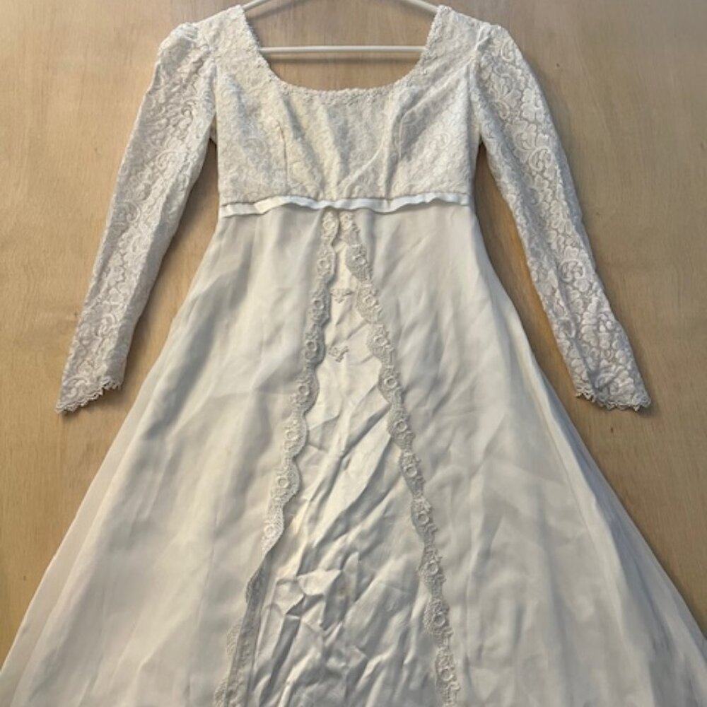 vintage-style bridal gown‎ classic empire waist, intricate lace, full sleeves
